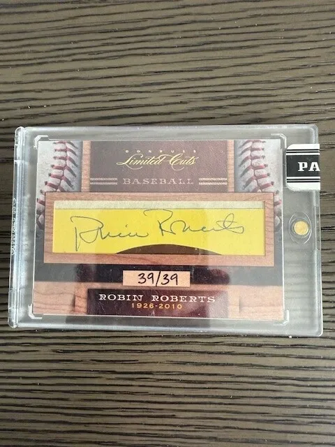 Cut signature memorabilia card featuring an authenticated signature embedded in the card